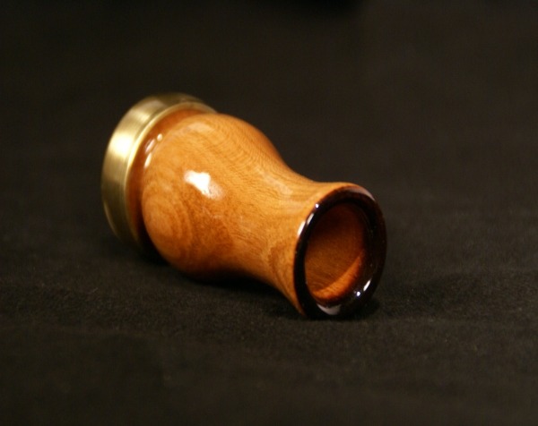 Custom wooden game call with a clear lacquer finish and ferrule, available in bulk for manufacturers and production runs.